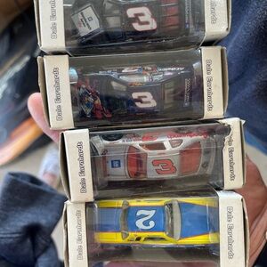 1999 Dale Earnhardt collectible all 4. One is the Superman edition